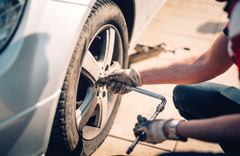 Technician fixing a tire