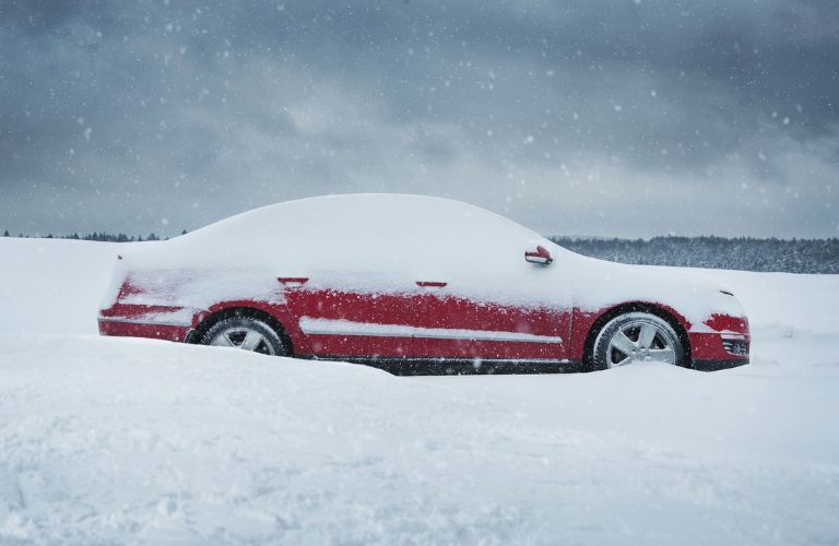 Snow covered car