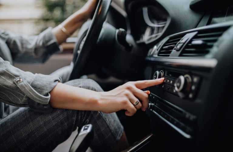 a woman driving a car