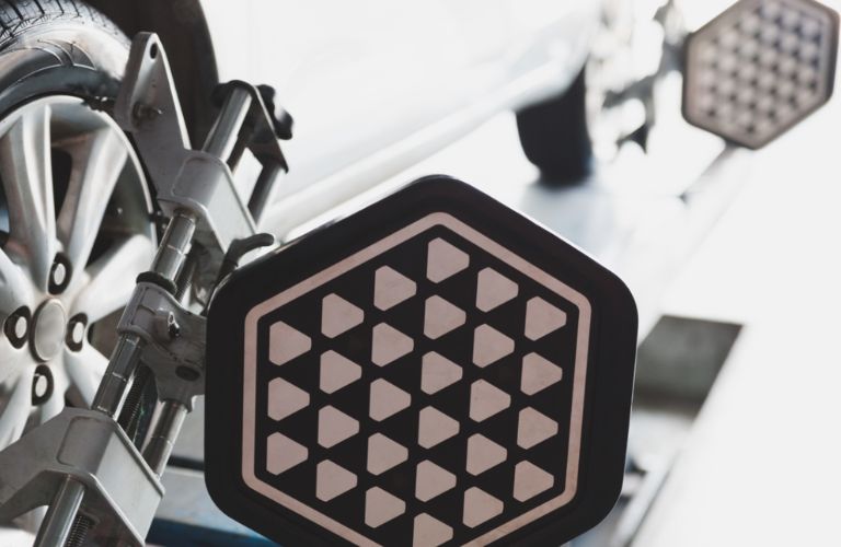 a car's wheels being aligned