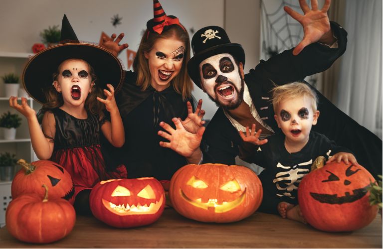 a family dressed up in costumes